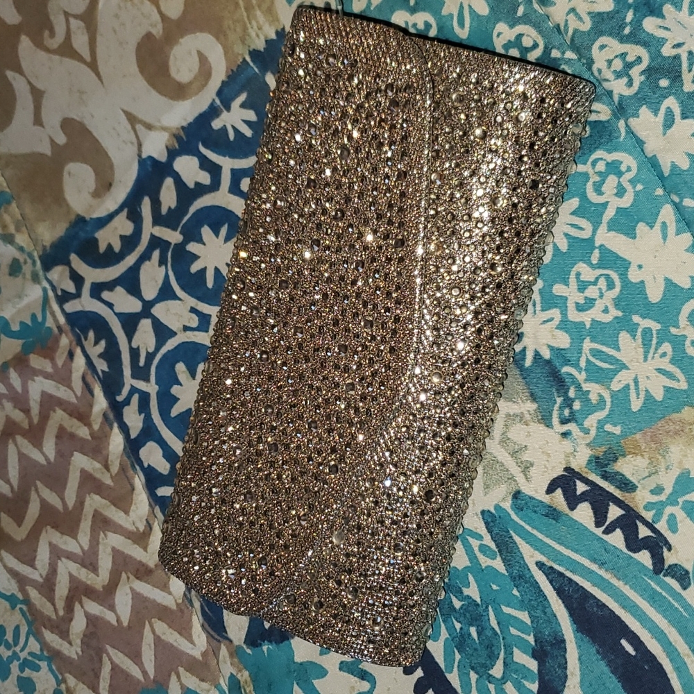 Small clutch for the evening with stones all over and chain